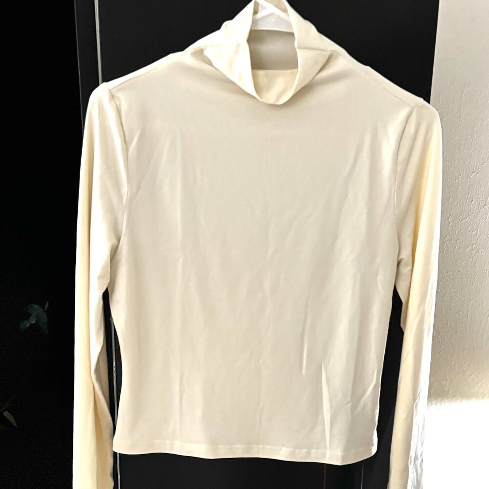 Cream colored small high neck sweater by S Deer